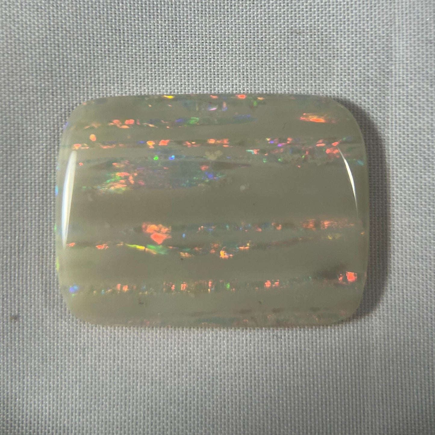 Large vertical Grawin displaying lines of magnificent colours. Can be cut or made into a huge pendant, or just kept for a perfect specimen.