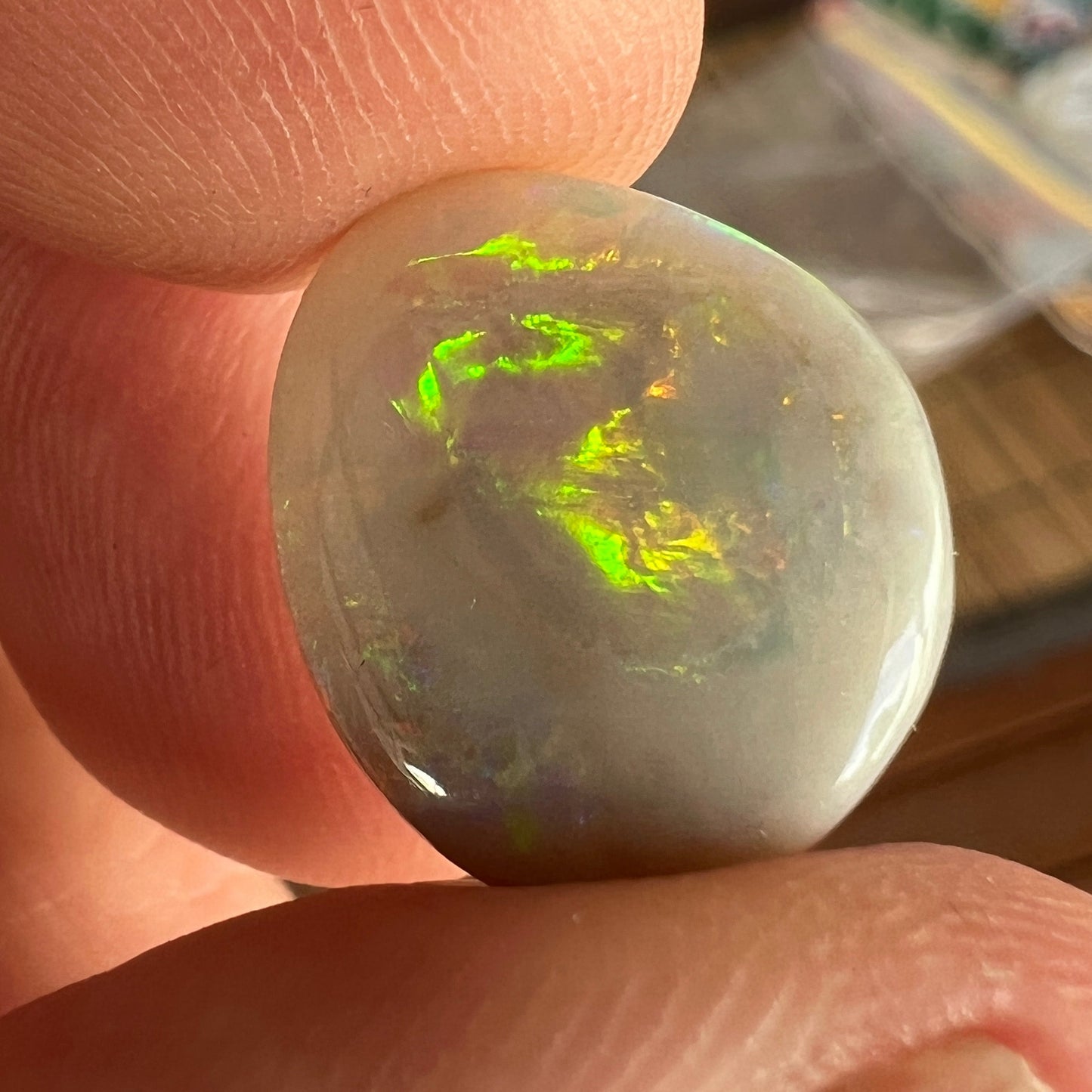 Rare Mintabie solid black opal, displaying vivid colours.
