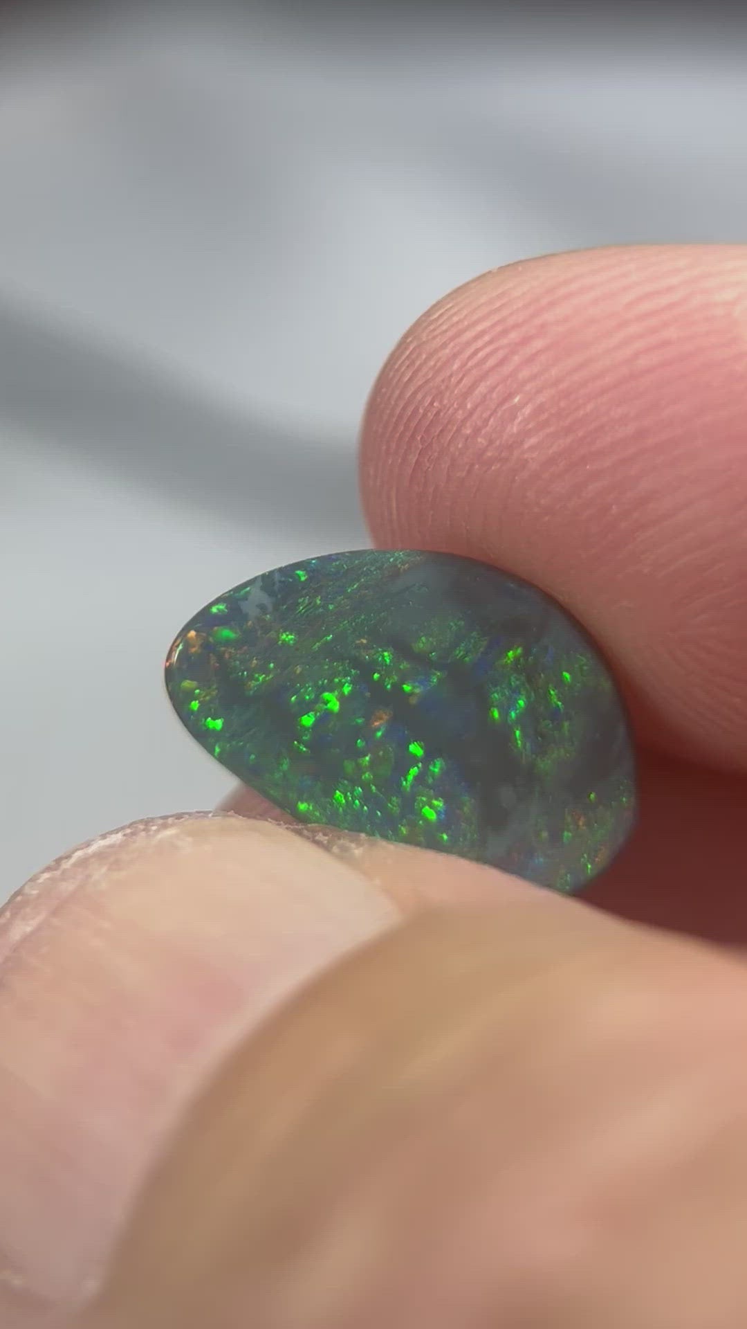 Lightning Ridge gem quality semi-black solid opal. Ready to make into that perfect ring or pendant. Beautiful greens and blues with a hint of reds.