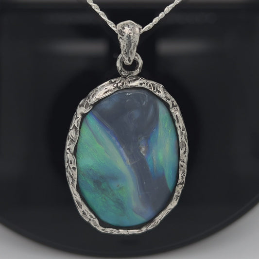 Awesome Lightning Ridge picture stone opal. Mounted with Argentium silver which complements the stone beautifully. Another Sally Fisher designer masterpiece.