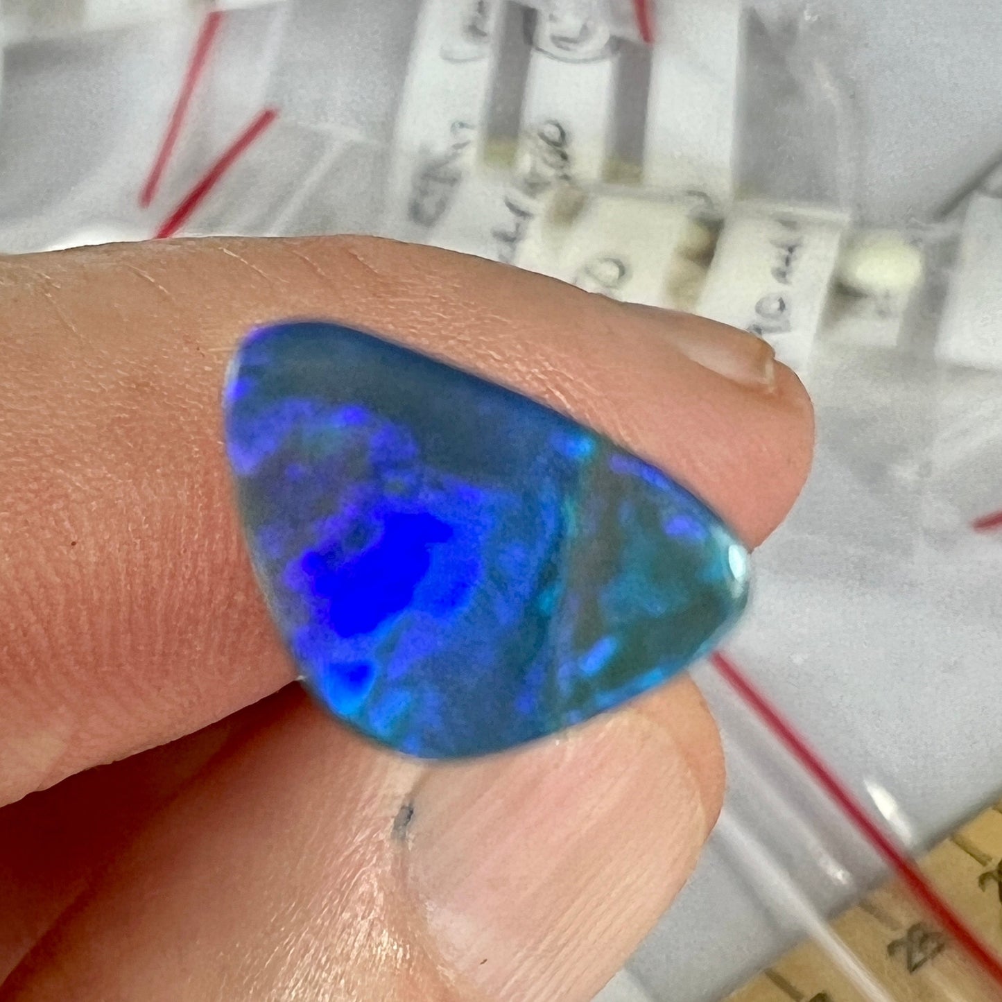 Solid blue/green Lightning Ridge opal. A nice little ring stone.