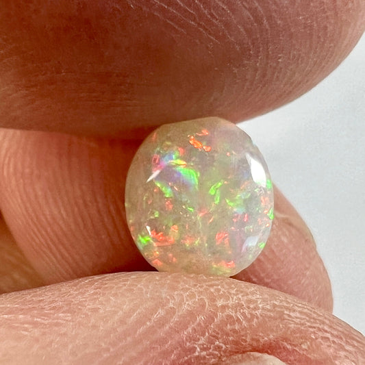 Double sided crystal opal with a perfect finish. An excellent solid opal with awesome colours.
