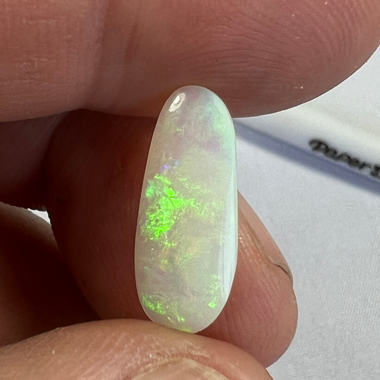 Nice semi crystal Coober Pedy gemstone showing beautiful colours. Cut and polished by Bill Johnston.