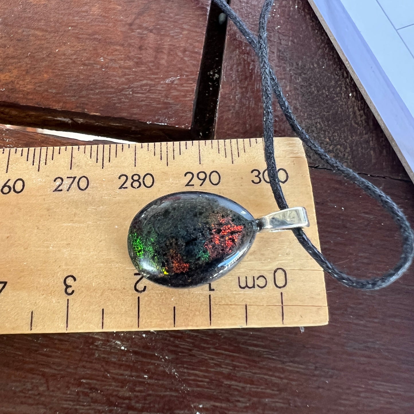 Andamooka Matrix opal pendant displaying great colours. Ready to wear.