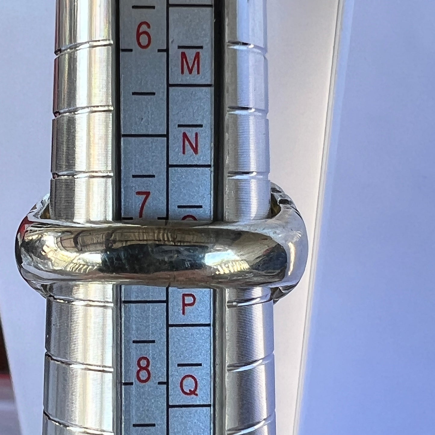 Fantastic one-off silver ring, crafted to show off this awesome Coober Pedy crystal opal. Square cushion cut showing magnificent greens.