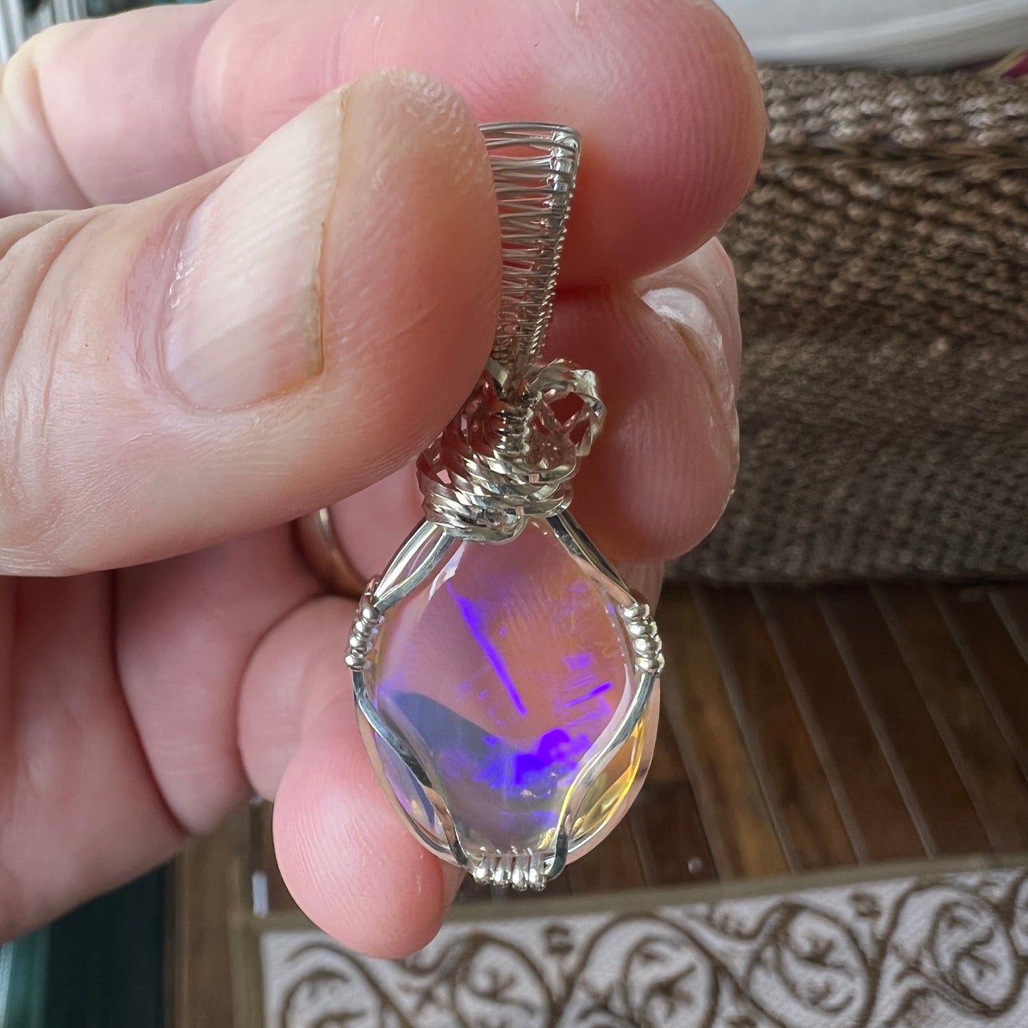 Beautifully cut Lightning Ridge Jelly Crystal opal. Cut and expertly polished by Bill Johnson and set in a unique silver wire wrap. An awesome hand made gift.