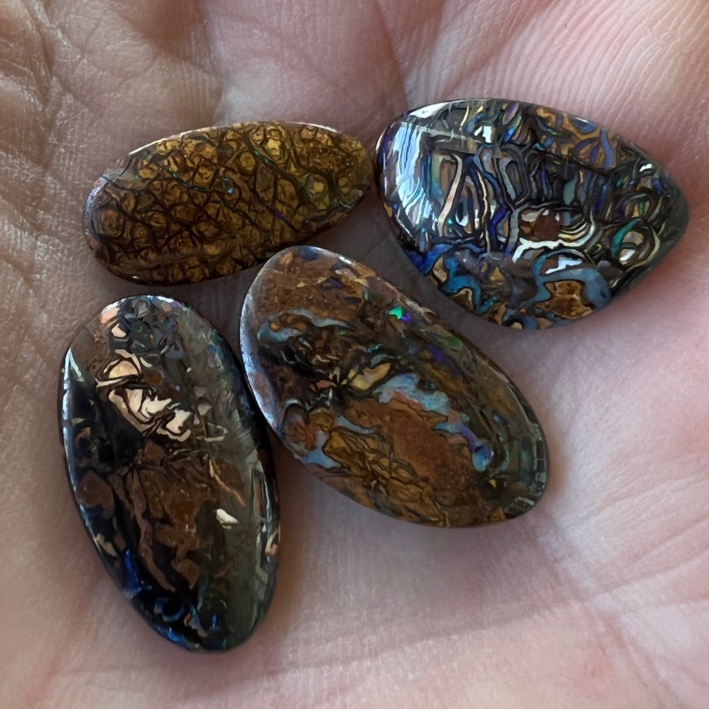 Lovely group of Queensland boulder opals with great patterns and colour.