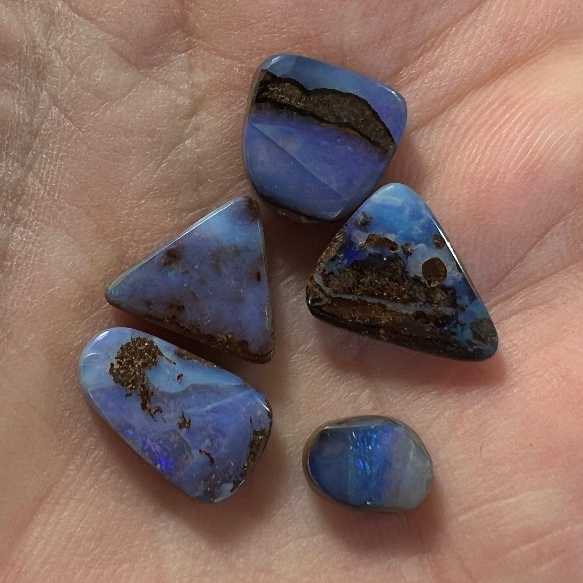 Five lovely pieces of Winton boulder opal. Nice blues and lovely polish.