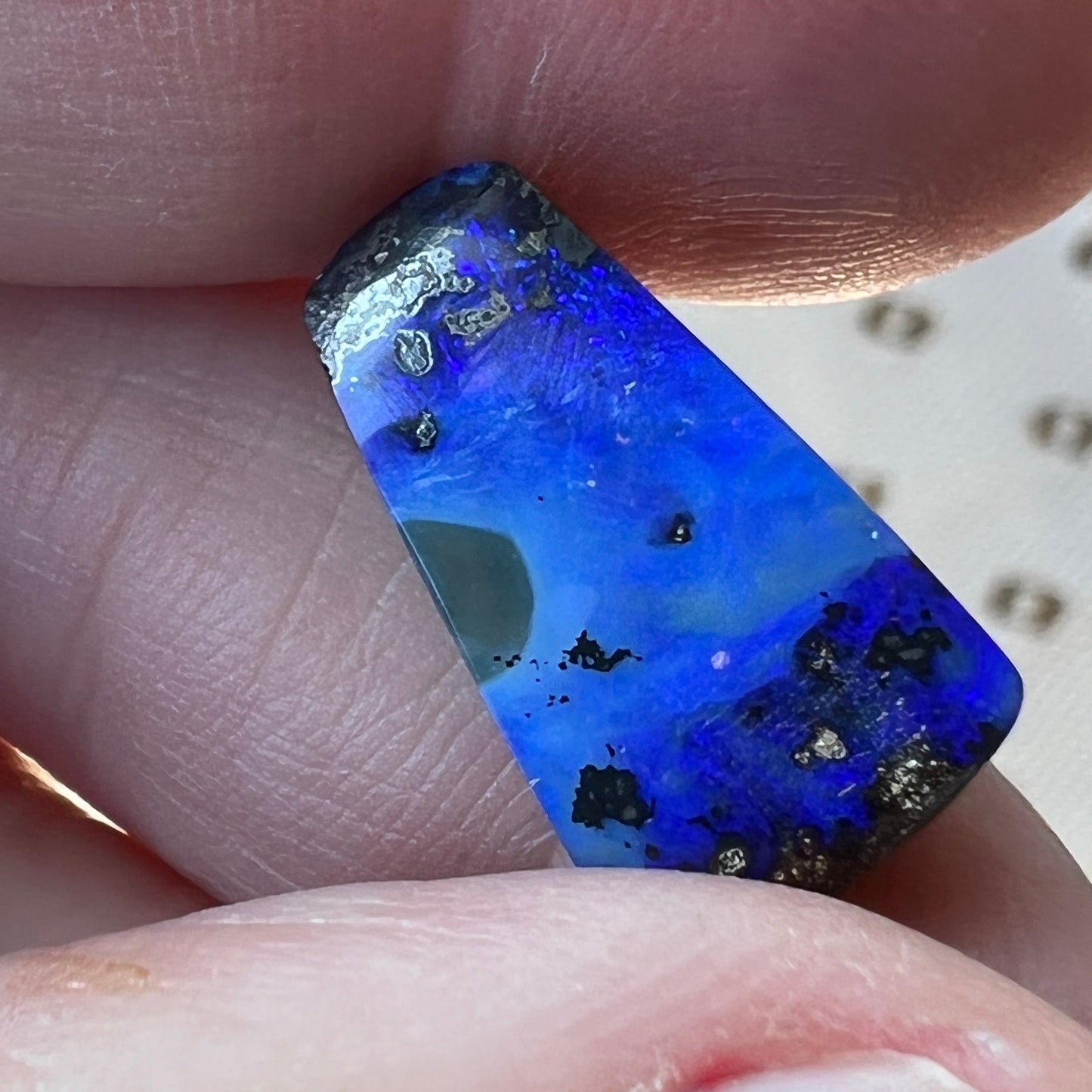 Nice bright blues are displayed throughout this Winton boulder opal.