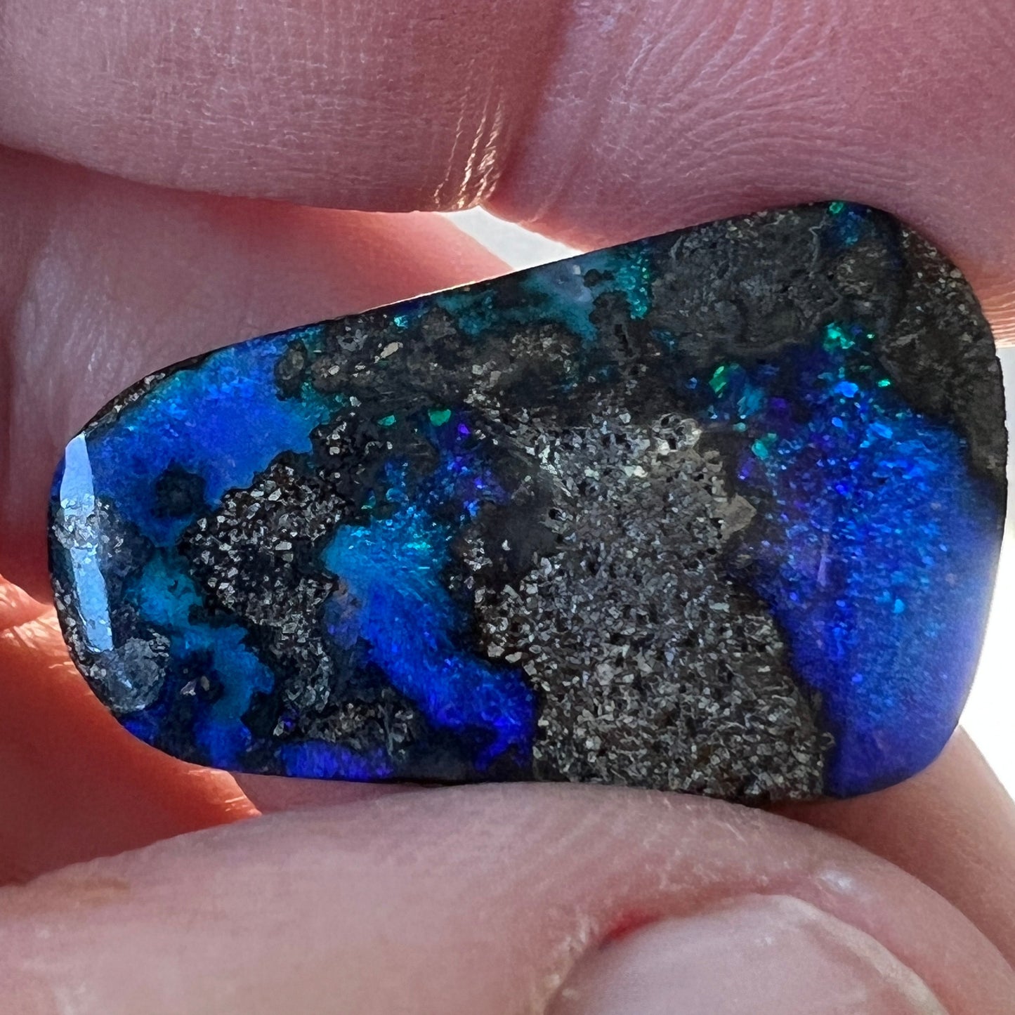 Stunning blues and greens in this great piece of boulder opal from Winton, Queensland.