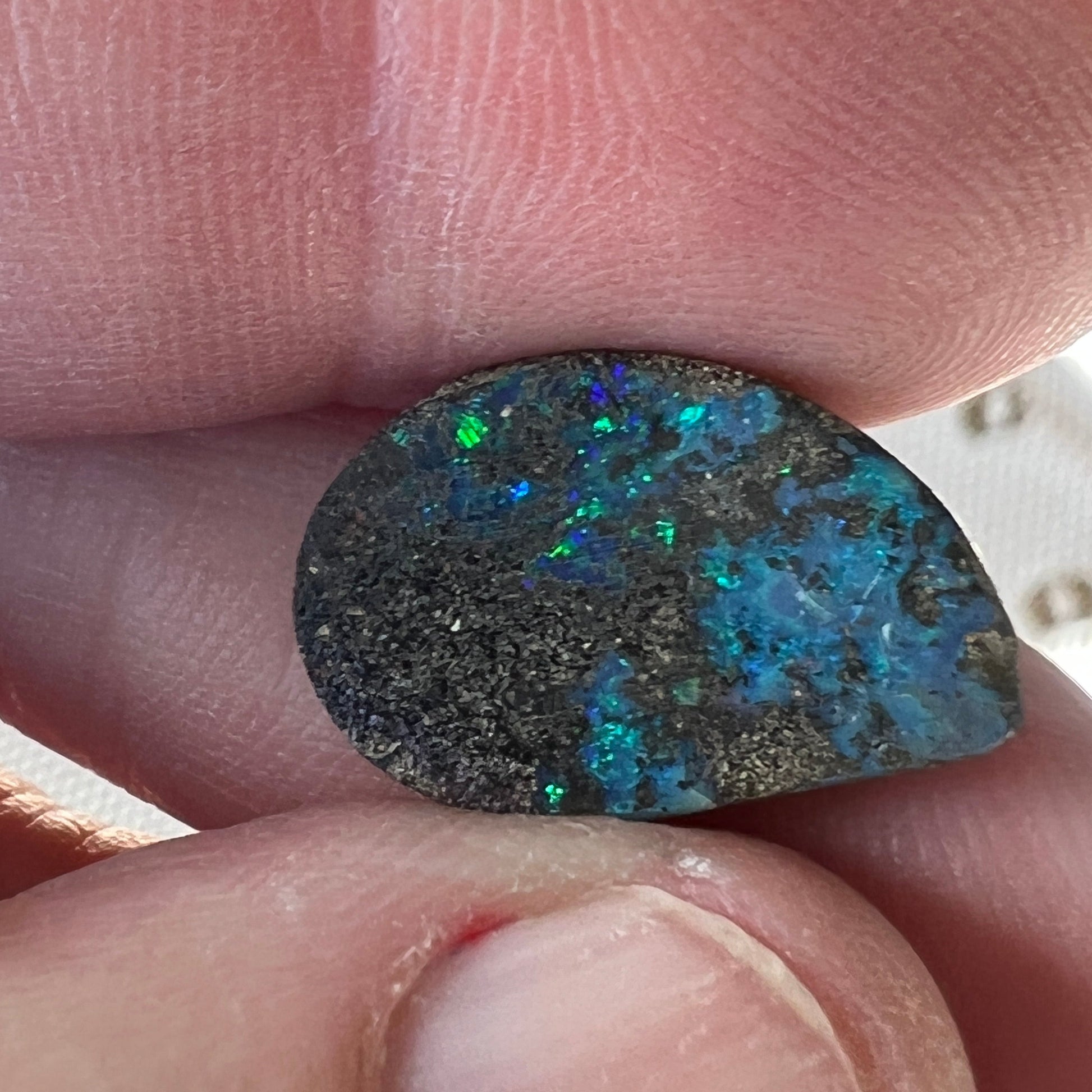 Winton boulder opal with lots of sparkle. Pretty blues and greens.