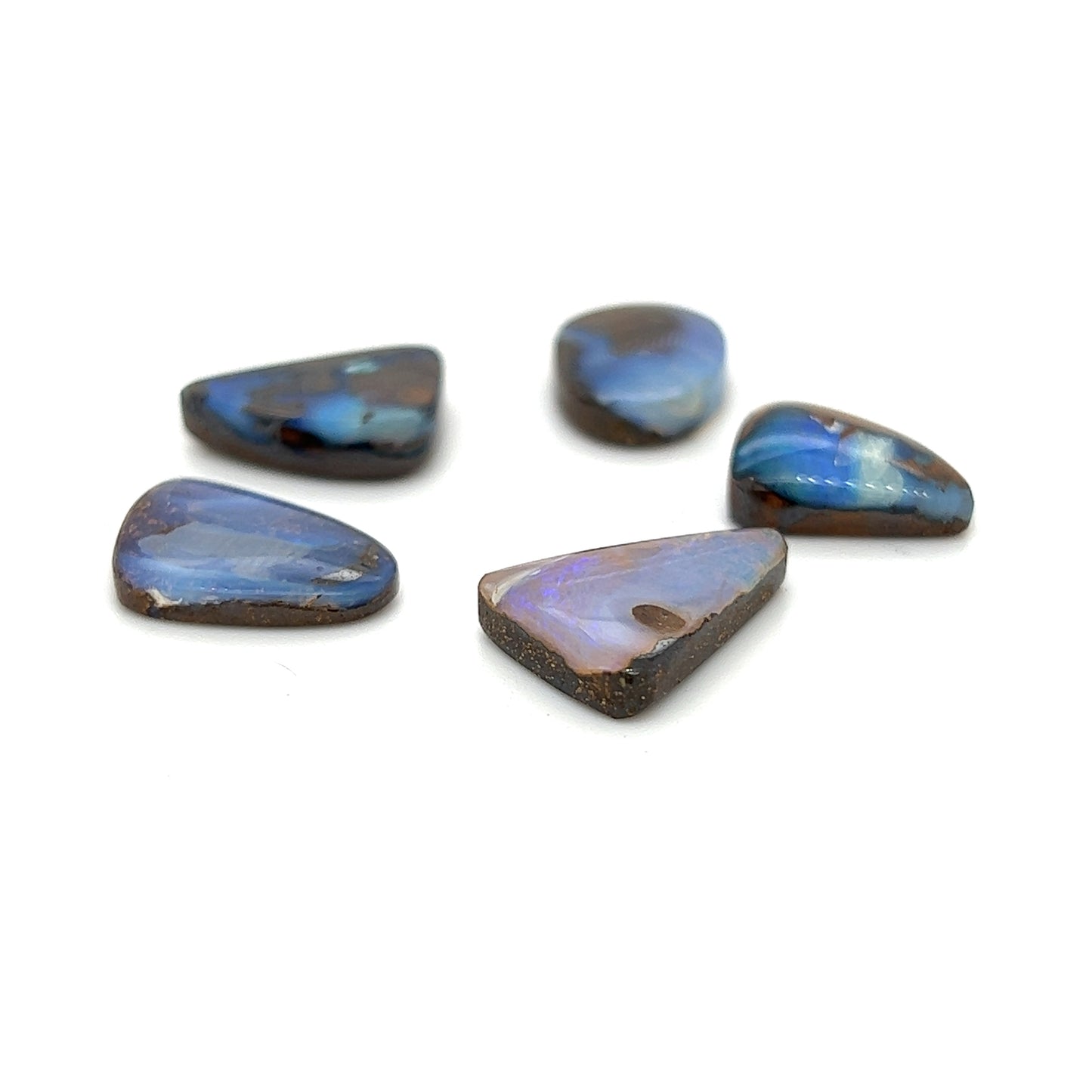 Great cut and polish on this bundle of five boulder opals. Perfect for rings or pendants.