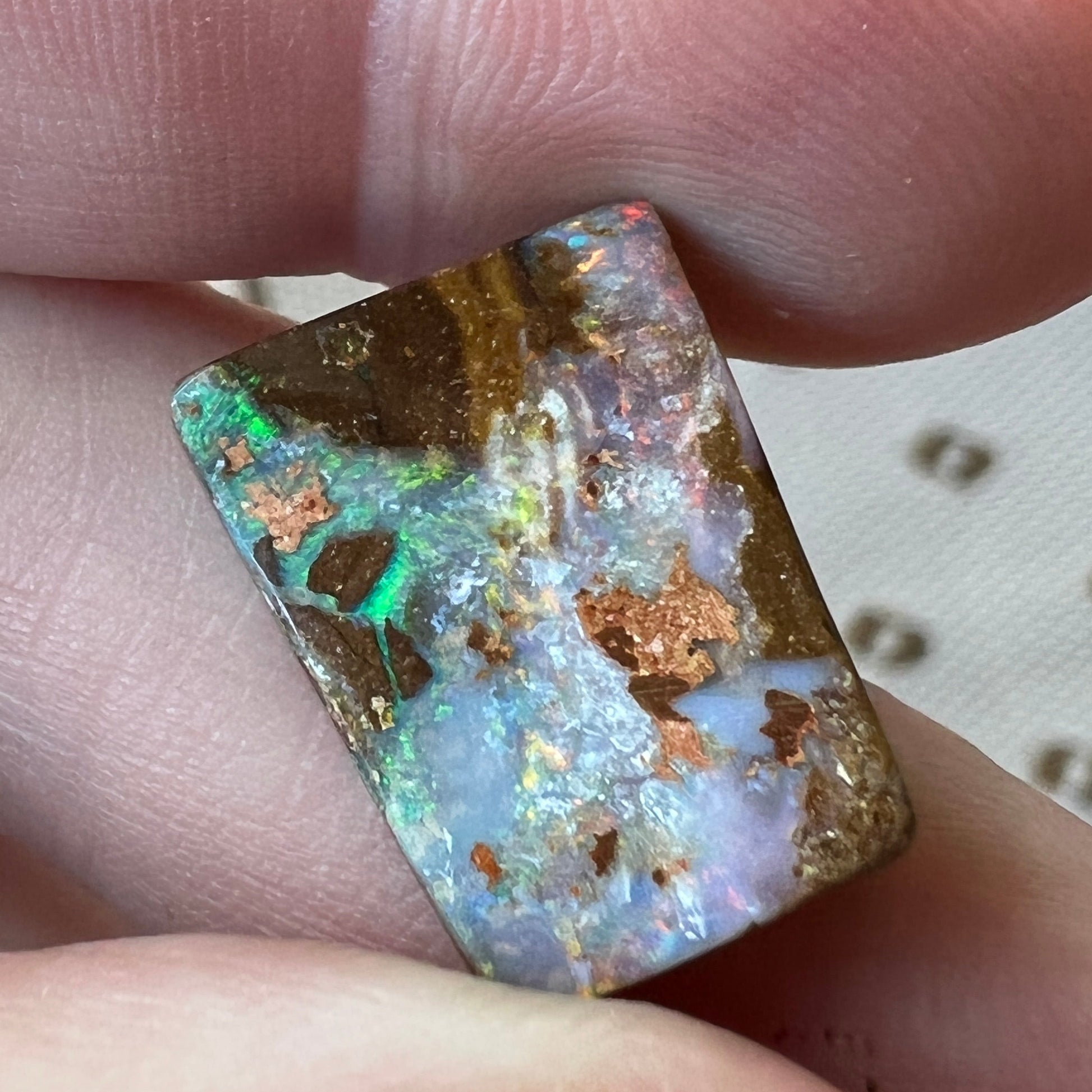 Nice square cut boulder opal from Winton, showing lovely colours.