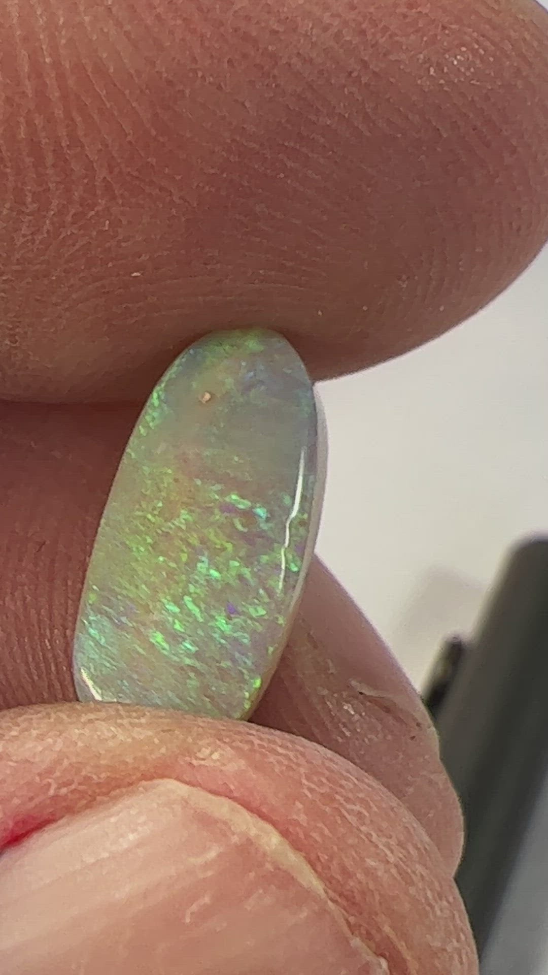 Lightning Ridge grey/green solid opal. Slight sand spot, should rub out, hence the discounted price.