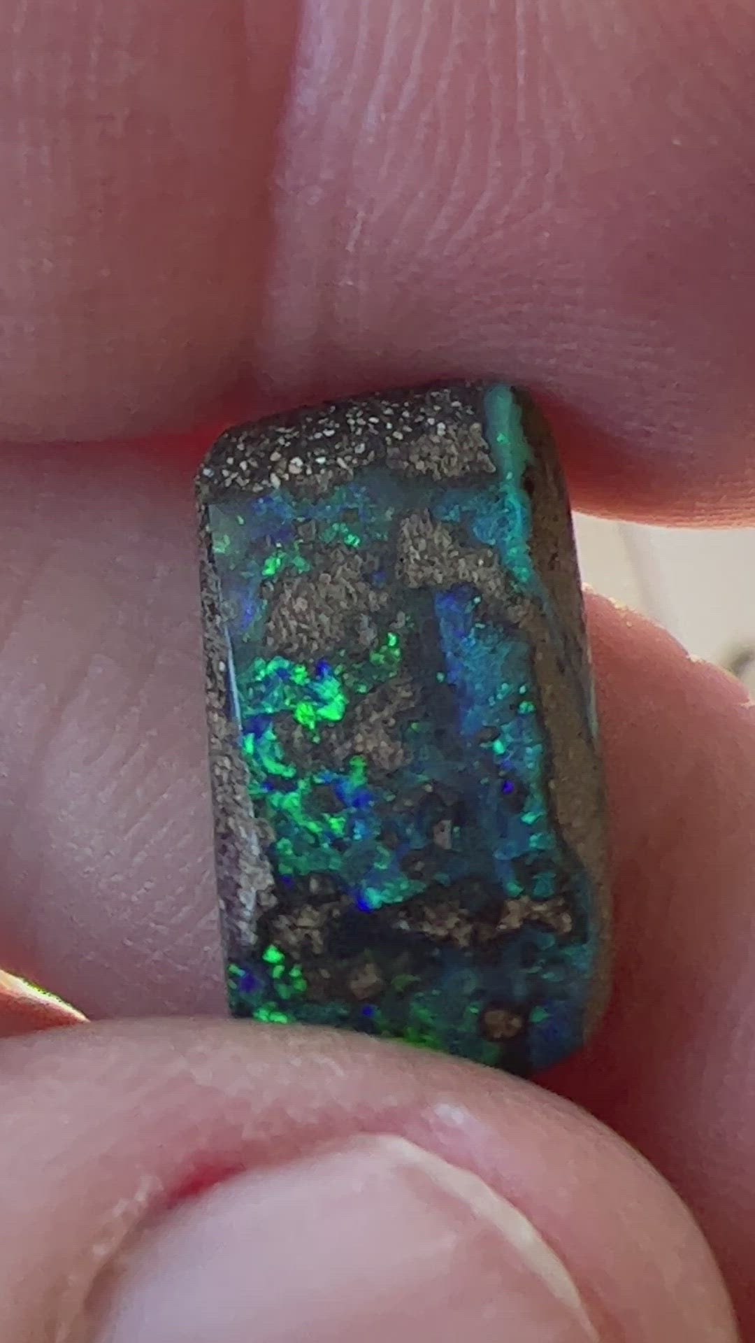 Nice greens and blues are shown within this lovely Winton boulder opal.